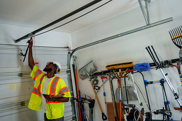 Professional Garage Door Panel Replacement technician working in Lorenz Park, NY